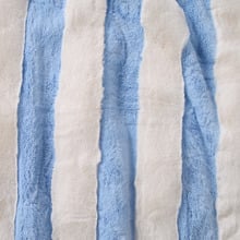 Aris Carved Stripe Faux Fur Throw